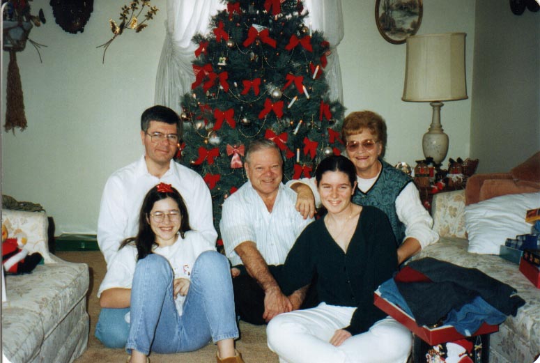 mom dad john girls xmas1995